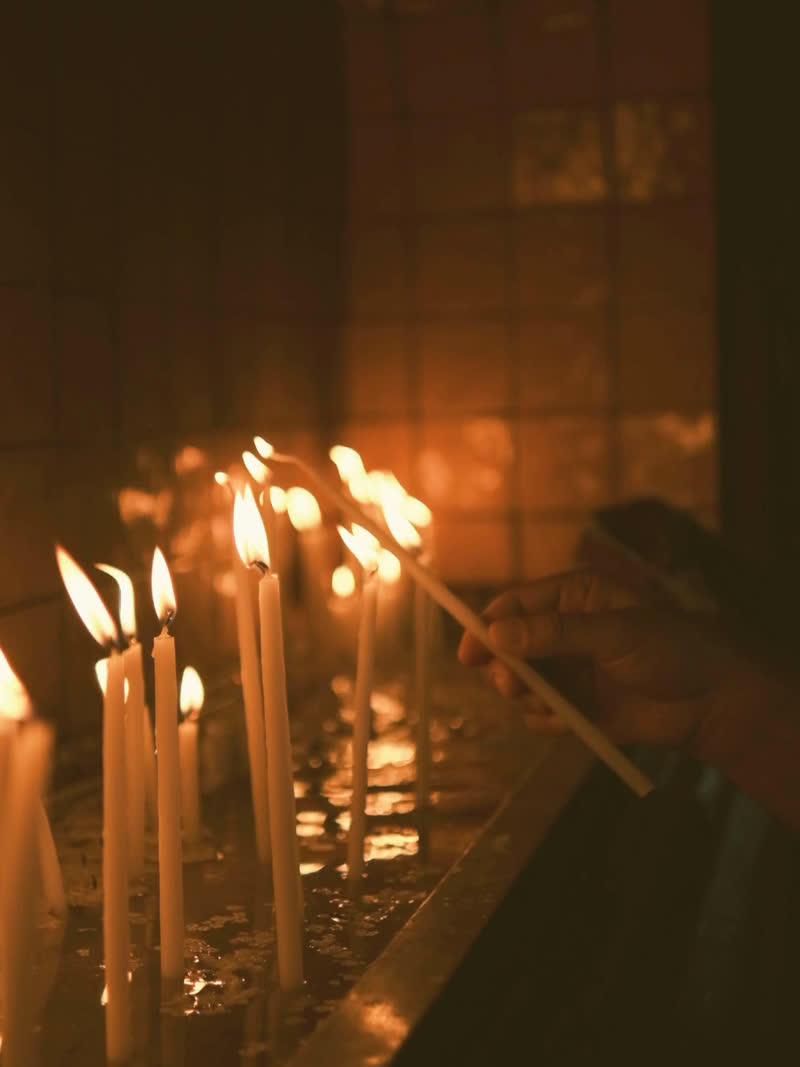 The still that carried "i sit with the flame"