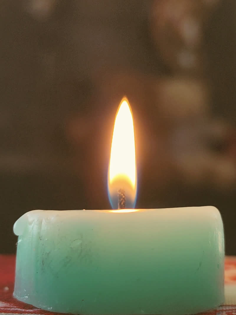 The still that carried "i sit with the flame"