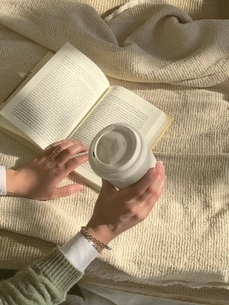 The still that carried "i started folding the laundry while it's still warm from the dryer, and somehow that turned the most boring chore into the softest part of my evening"
